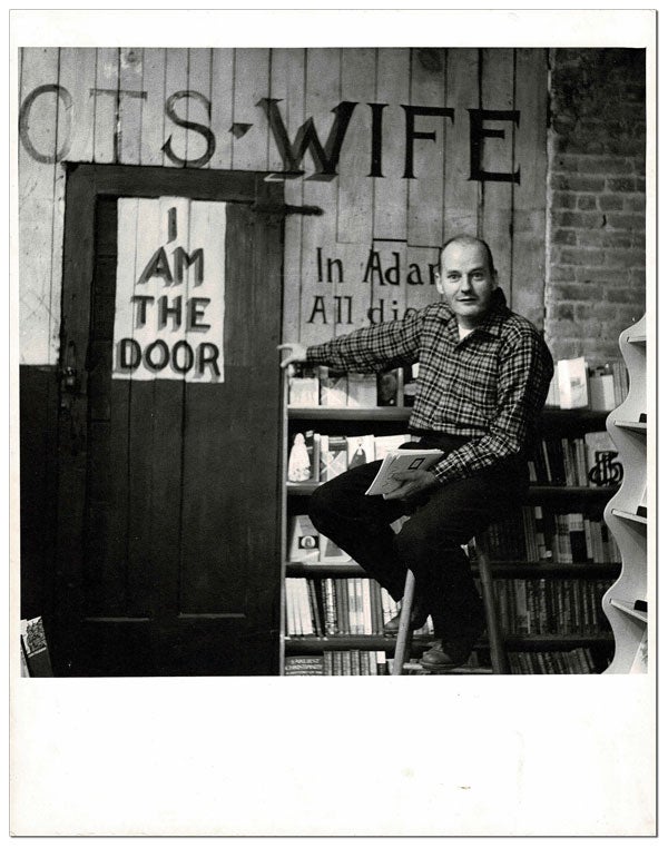 Item #4215 ORIGINAL PHOTOGRAPH OF LAWRENCE FERLINGHETTI IN THE BASEMENT OF CITY LIGHTS BOOKSTORE. William J. Eisenlord.