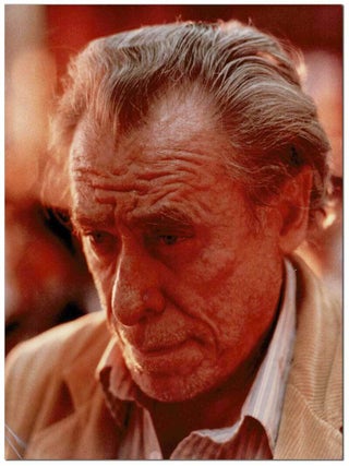 Item #7275 ORIGINAL PHOTOGRAPHIC PORTRAIT OF CHARLES BUKOWSKI AT THE RACETRACK. Charles Bukowski,...